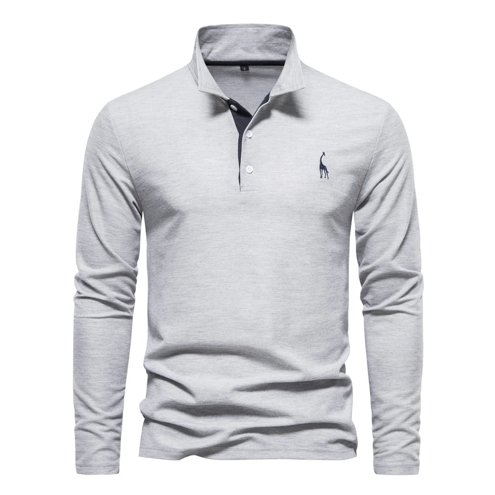 A modern light gray long-sleeve polo shirt with an embroidered logo, offering a clean and minimalist aesthetic.