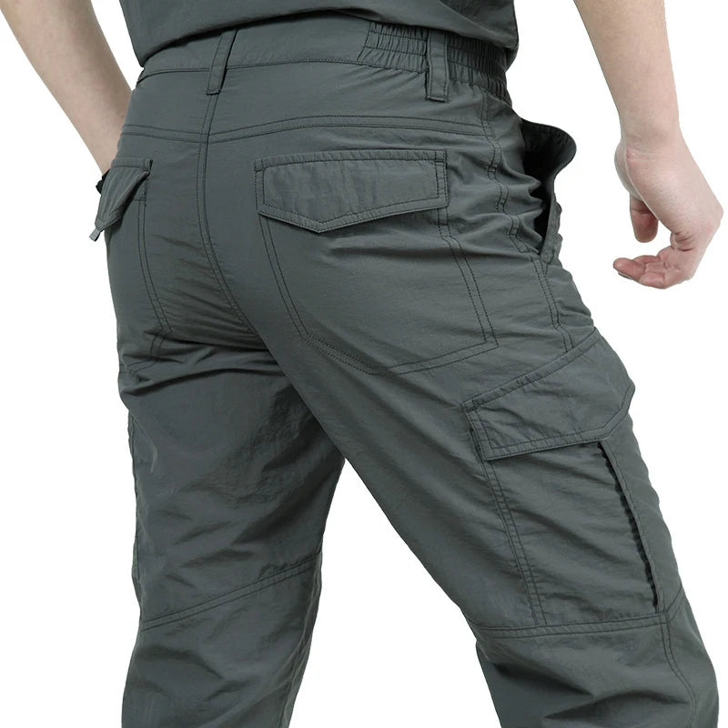Black tactical pants with reinforced knees and side pockets