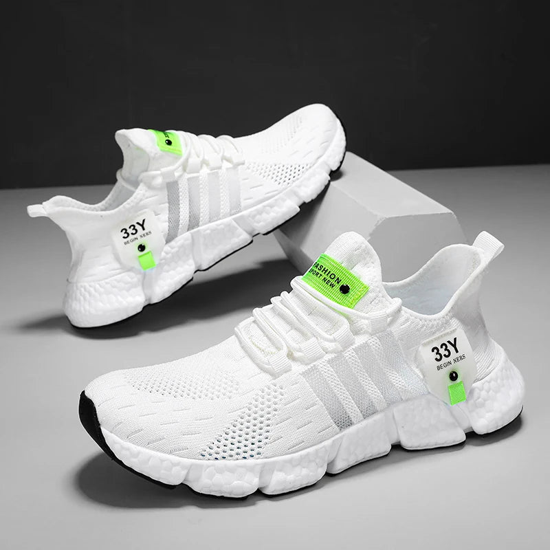 Running sneakers positioned next to foam roller and water bottle