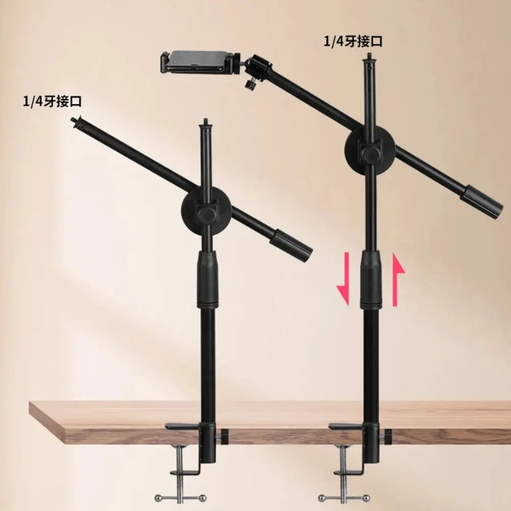 The overhead tripod phone mount is attached to a bench top, arrows displaying that the main arm is adjustable.